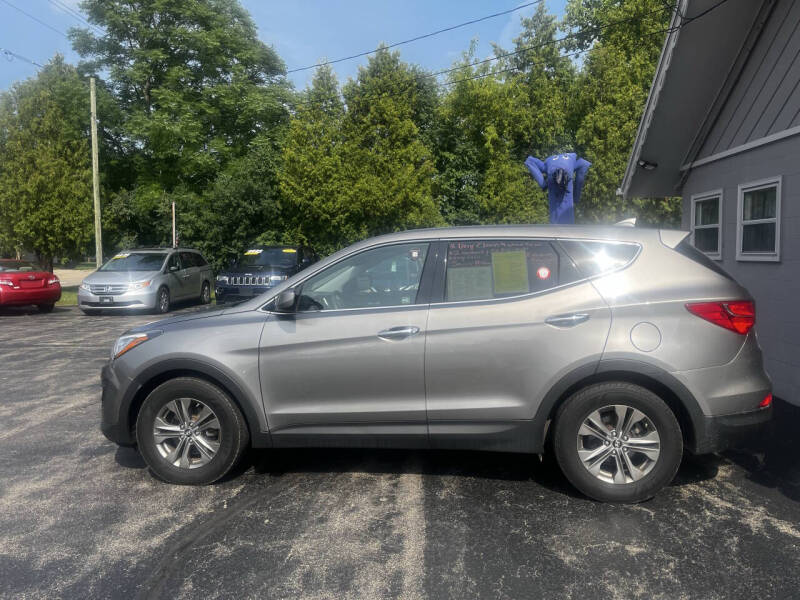 hyundai santa fe 2014 5XYZTDLB3EG198559 image hyundai santa fe 2014 5XYZTDLB3EG198559 image